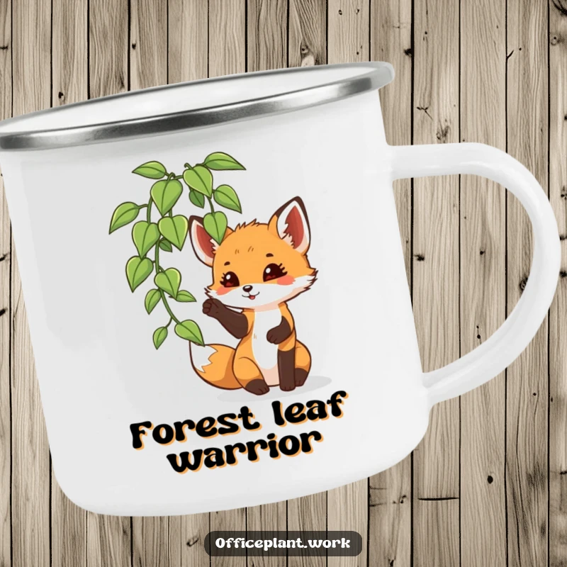 Funny fox cub camping mug, a playful creature batting at an office plant leaf, designed for outdoor enjoyment and woodland humor.