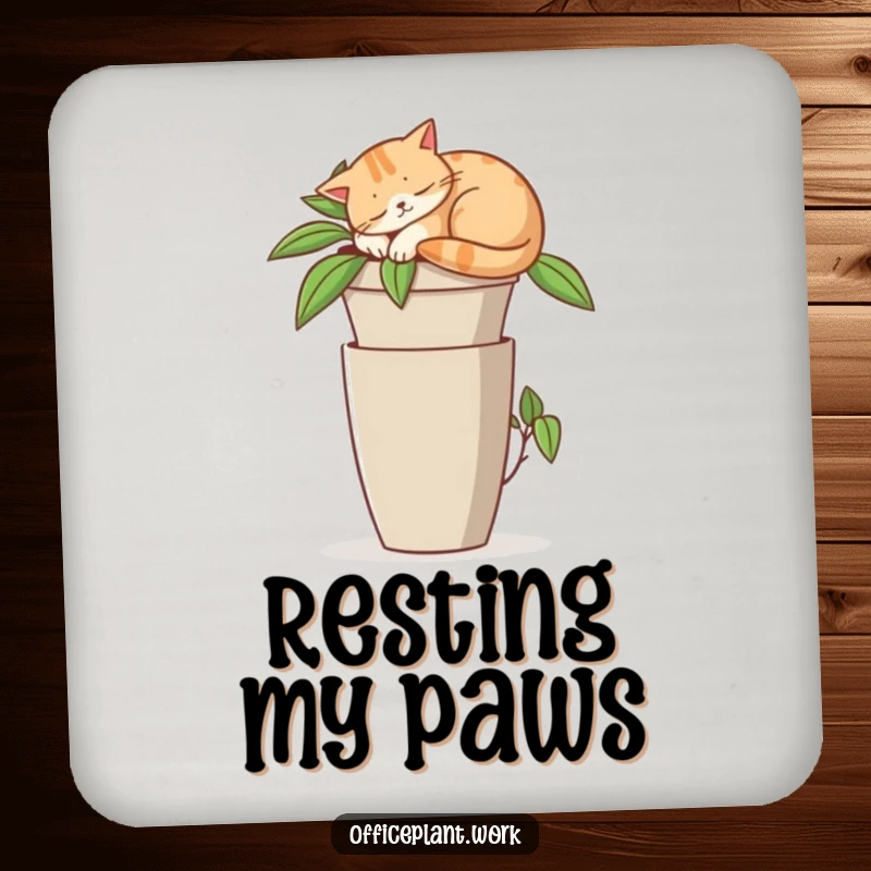 Funny drink coaster showing a contented cat napping on a tall office plant pot, protecting surfaces with humor.