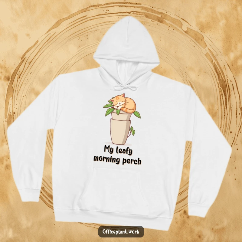 Funny hoodie depicting a contented cat napping soundly on a lush office plant pot, a funny, cozy scene.